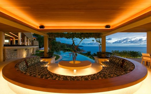 Elegant indoor lounge with ocean views and modern design features.