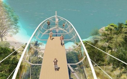 Glass bridge structure at Anan Property Group project with scenic water views.