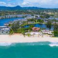 Aerial view of tropical beachfront resort and lagoon