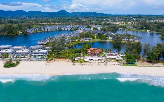 Aerial view of tropical beachfront resort and lagoon