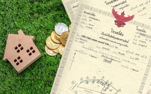 House model, Bitcoin coins and property deeds