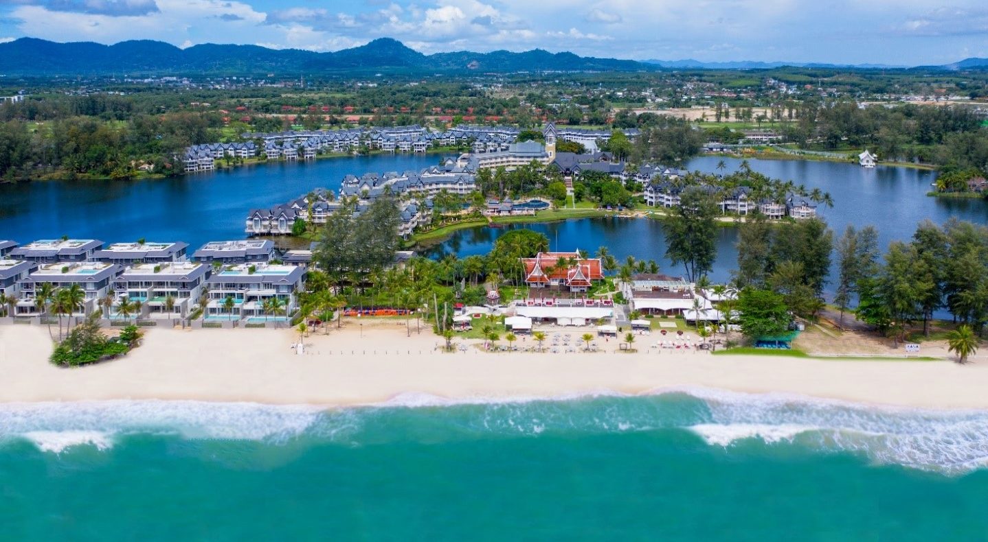 Aerial view of tropical beachfront resort and lagoon