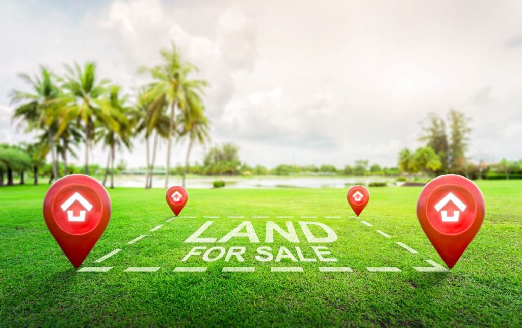 Green plot marked land for sale