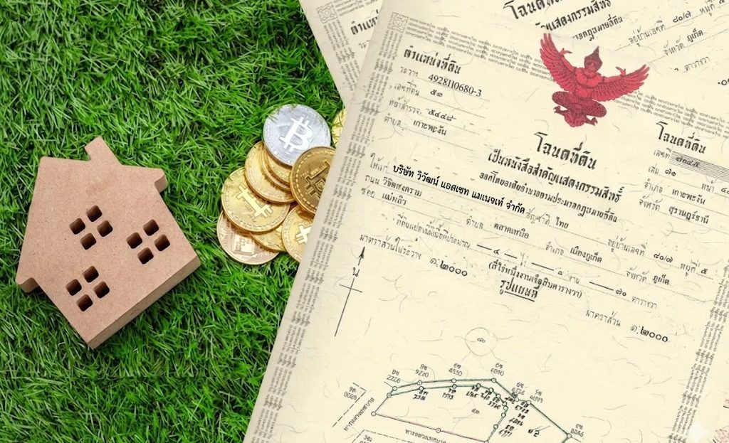 House model, Bitcoin coins and property deeds