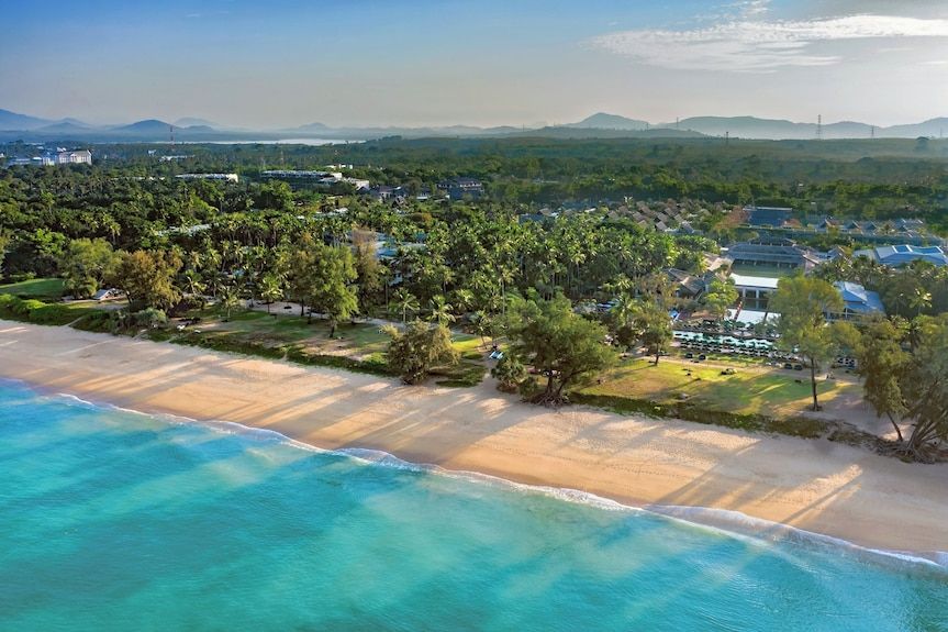 Aerial view of tropical beach resort coastline