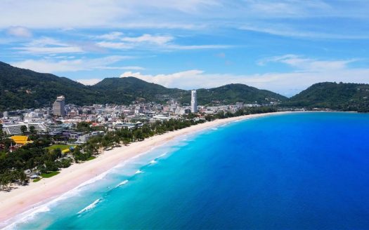Aerial view of tropical beach and coastal city