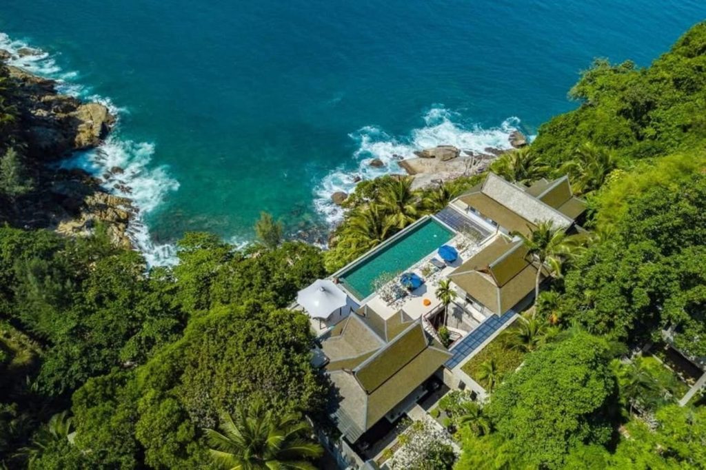 Clifftop villa with infinity pool overlooking turquoise sea
